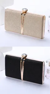 Glitter evening clutch detail showing premium sequin fabric, elegant metal clasp and alloy edge.