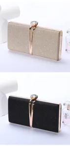 Details view of elegant glitter evening clutch bags in gold and black with crystal metal clasp.