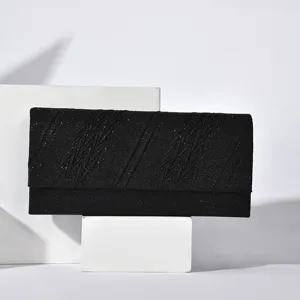 Elegant black glitter evening clutch bag, rectangular crossbody bag with chic textured lines.