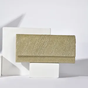 Gold glitter clutch bag for women, elegant evening party handbag with sparkly finish.