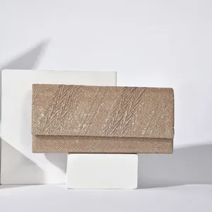 Elegant gold glitter evening clutch bag for women, stylish rectangular design for parties.