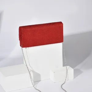 Red glitter evening clutch bag for women, stylish rectangular shoulder bag with chain.