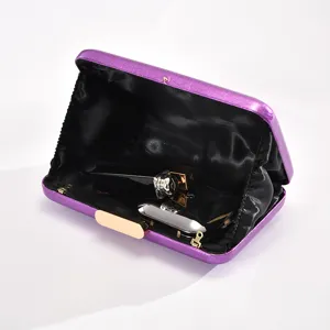 Elegant purple clutch bag with metallic clasp, perfect for evening parties and weddings.