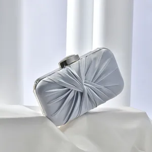 Detailed view of the elegant silver pleated evening clutch bag, perfect for banquets and parties.