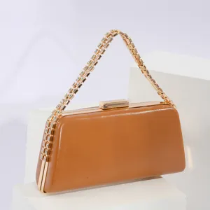 Elegant brown PU leather evening clutch bag with sparkly rhinestone chain handle for women parties.