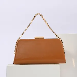 Brown PU leather evening handbag with chic gold chain strap and metal lock closure detail.