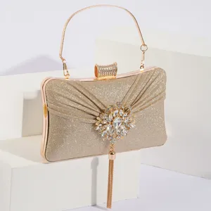 Sac de soirée doré élégant avec tissu pailleté, design plissé et magnifique fermoir en strass.