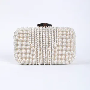 Elegant pearl evening clutch bag for women, vintage wedding bridal handbag with metal clasp.