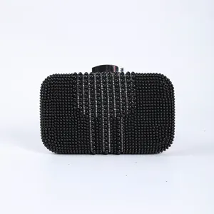 Black beaded evening clutch bag with sparkling rhinestone stripes and metal clasp closure.