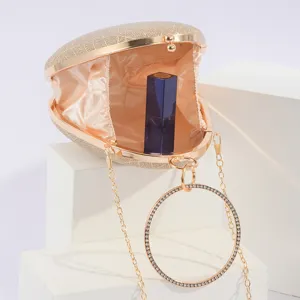 Elegante goldene Muschel-Abendtasche mit Strass-Ringgriff und Kette für feierliche Anlässe.