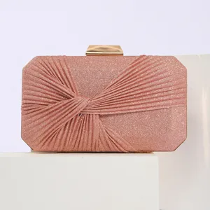 Elegant pink glitter pleated evening clutch bag with gold-tone metal clasp for women party.
