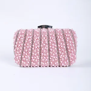 Exquisite pearl beaded evening clutch bag, elegant rhinestone design for party and wedding.