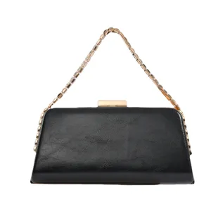 Elegant black PU leather evening clutch bag with sparkling rhinestone chain strap for women.