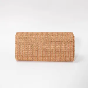Woven texture evening clutch bag detail, stylish women's envelope bag for daily use.