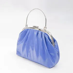 Elegant blue pleated clutch bag with silver metal handle and clasp for women evening.