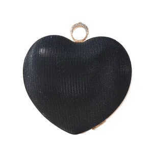 Elegant black glitter heart clutch bag with rhinestone ring handle for evening party dresses.