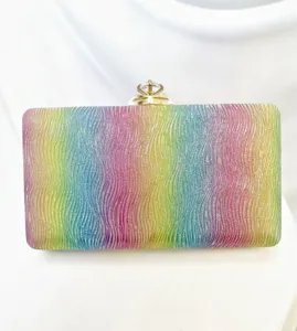 Stunning rainbow glitter evening clutch bag with crystal clasp detail for women parties.