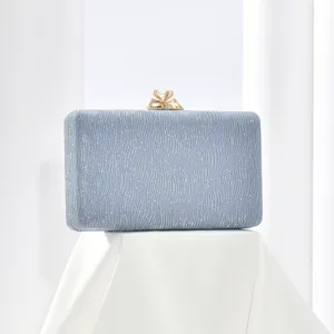 Elegant glitter evening clutch bag with crystal clasp for women parties and formal events.