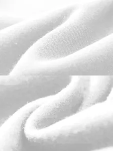 Detailed view of soft white fleece fabric for men's sportswear and hoodie manufacturing.