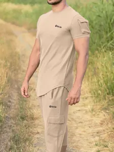 Detailed view of the men's casual short sleeve t-shirt and cargo shorts set in khaki.