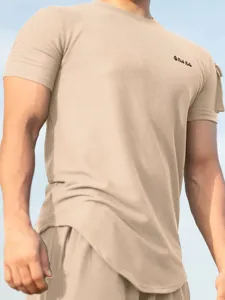 Detail shot of men's casual short sleeve waffle t-shirt in khaki, breathable fabric.