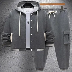 Detail view of mens gray hooded jacket and cargo sweatpants tracksuit set with drawstrings.
