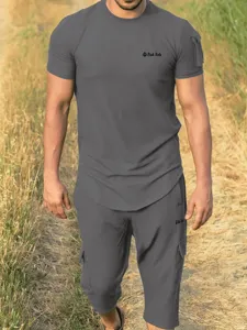 Men's casual short sleeve t-shirt and cargo shorts set, comfortable dark gray summer outfit.