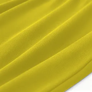 Close-up view of soft yellow fabric texture showing fine weave and elegant drape folds.