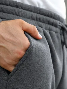 Mens grey casual sweatpants pocket detail fabric close up texture display view item