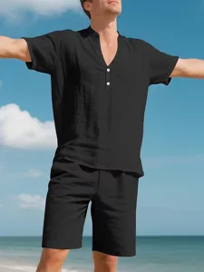 Detailed view of men's summer casual short sleeve shirt and shorts set in solid black.