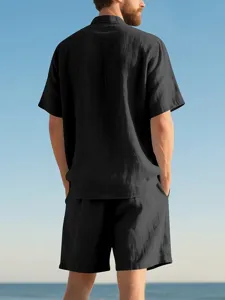Men's solid black short sleeve lapel shirt and matching casual shorts summer two piece set.