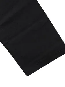 Close up view of black fabric with neat stitching texture detail for apparel design.