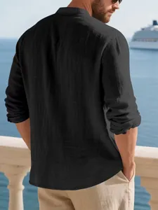 Close-up detail of casual black linen long sleeve shirt for men, perfect for summer resort wear.