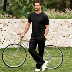 Completo casual da uomo in tessuto waffle con maniche corte e pantaloni nero moda estate
