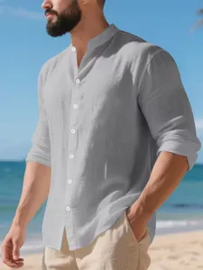 Detailed view of casual men's long sleeve henley shirt in light grey linen style for beach.