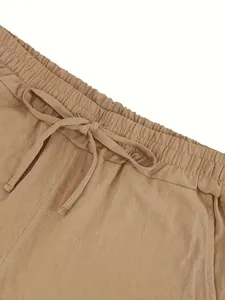 Close-up detail of men's casual linen shorts elastic waistband with adjustable drawstring.