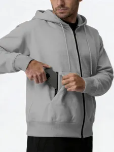 Vue detaillee du sweat a capuche zippe pour homme en gris avec poche zippee fonctionnelle.