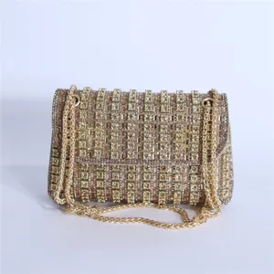 Luxury rhinestone evening bag with gold chain strap, elegant crystal shoulder bag for women.