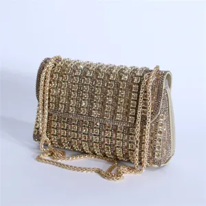 Luxury sparkling rhinestone evening bag for women, elegant gold chain shoulder handbag.
