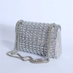 Elegant silver rhinestone evening shoulder bag with chain strap for women party dress wear.