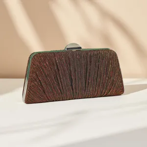 Elegant pleated evening clutch bag with metallic frame and clasp for women stylish parties.