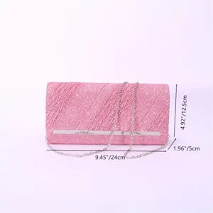 Pink glitter evening clutch bag for women, elegant shoulder handbag with chain strap.