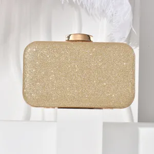 Elegant gold glitter clutch bag for evening parties, weddings and formal events with metal clasp.