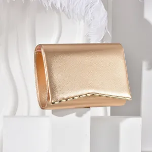 Gold evening clutch bag, elegant metallic wave trim detail, sophisticated handbag accessory.
