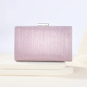Elegant pink glitter evening clutch bag for women, stylish party purse with silver lock.