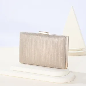 Elegant women's evening clutch bag with fine glitter finish and metal clasp for party.