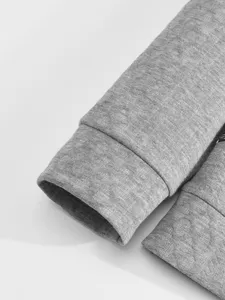 Men's grey casual sweatshirt sleeve detail shot, comfortable everyday long sleeve top.