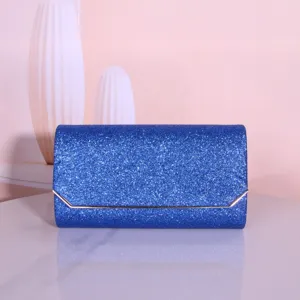 Blue glitter evening clutch bag detail view, elegant sparkly design for parties and wedding.