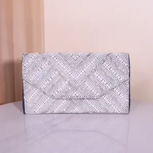 Exquisite pearl and rhinestone evening clutch bag for women, elegant envelope design for party.