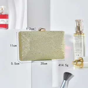 Elegant gold rhinestone evening clutch bag with metallic clasp for party and wedding events.